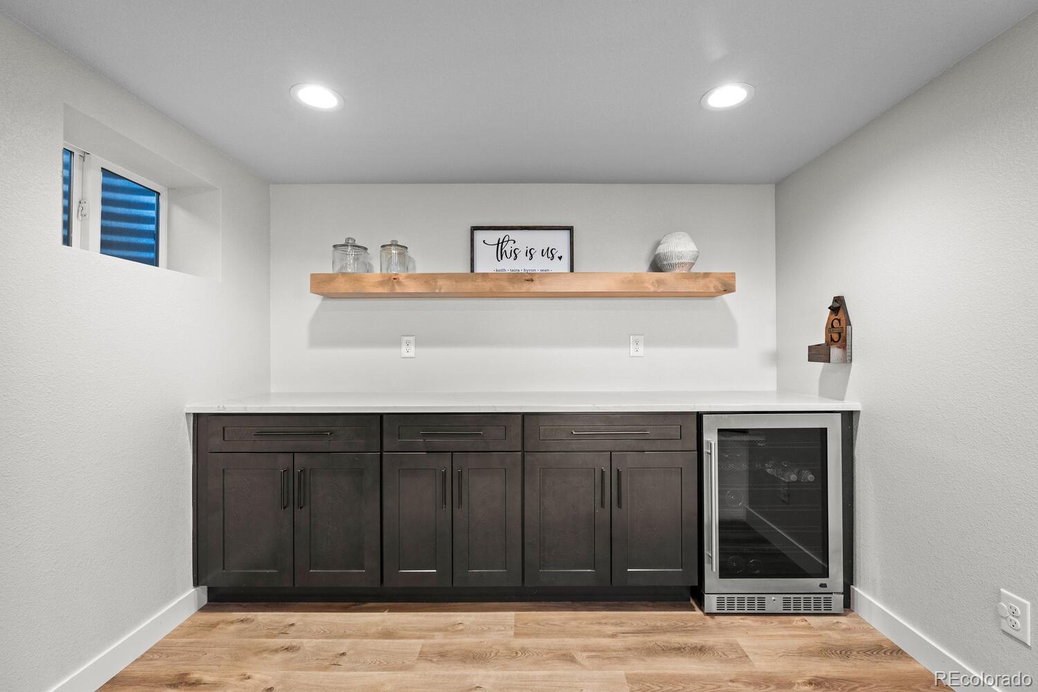 8855 South Wild Iris Run Highlands Ranch, CO 80126 - Photo 37 of 48 a view of a sink with cabinet