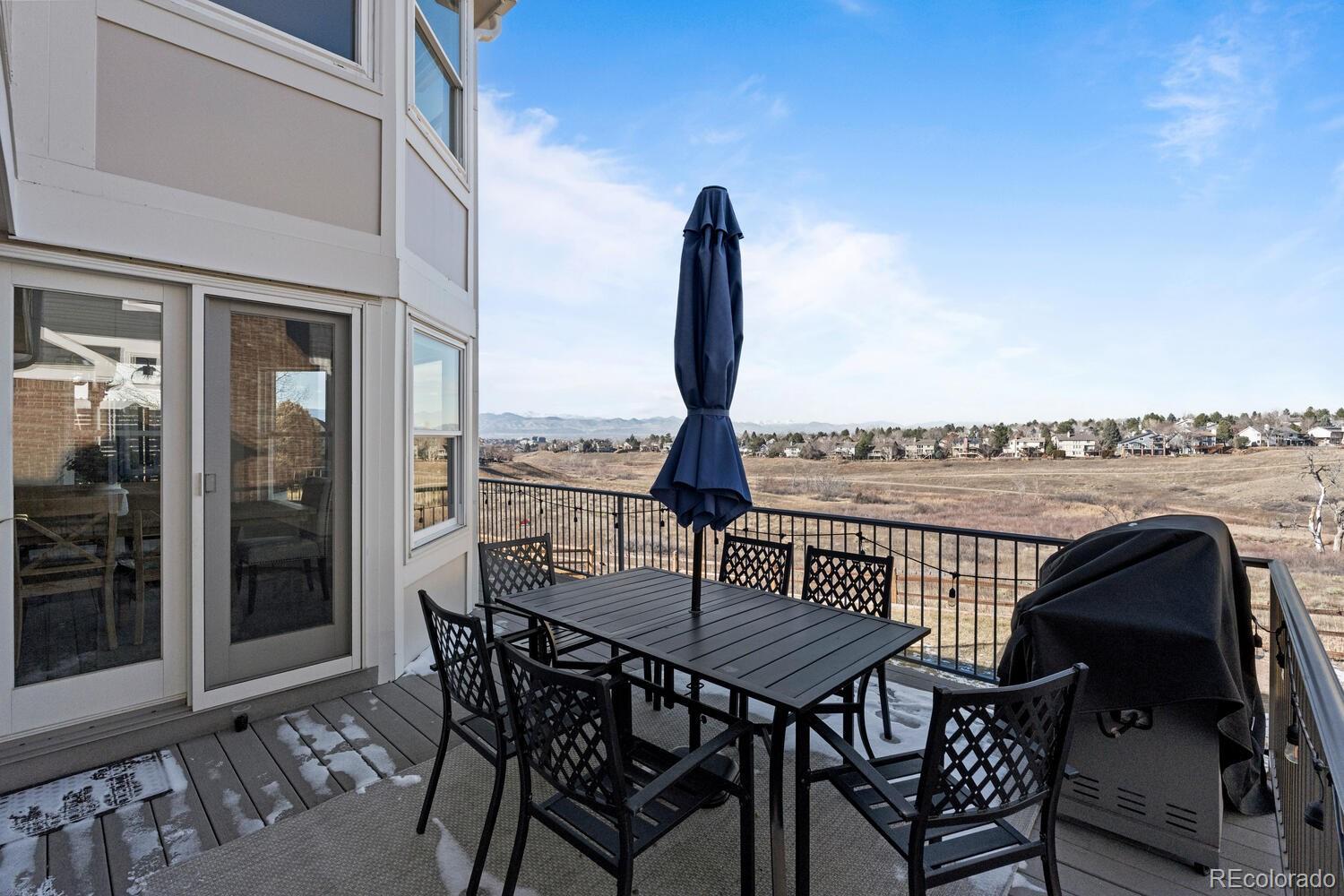 8855 South Wild Iris Run Highlands Ranch, CO 80126 - Photo 40 of 48 a view of a balcony with furniture