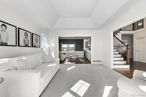 a spacious bedroom with a bed and window