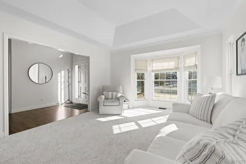 a living room with furniture and a table