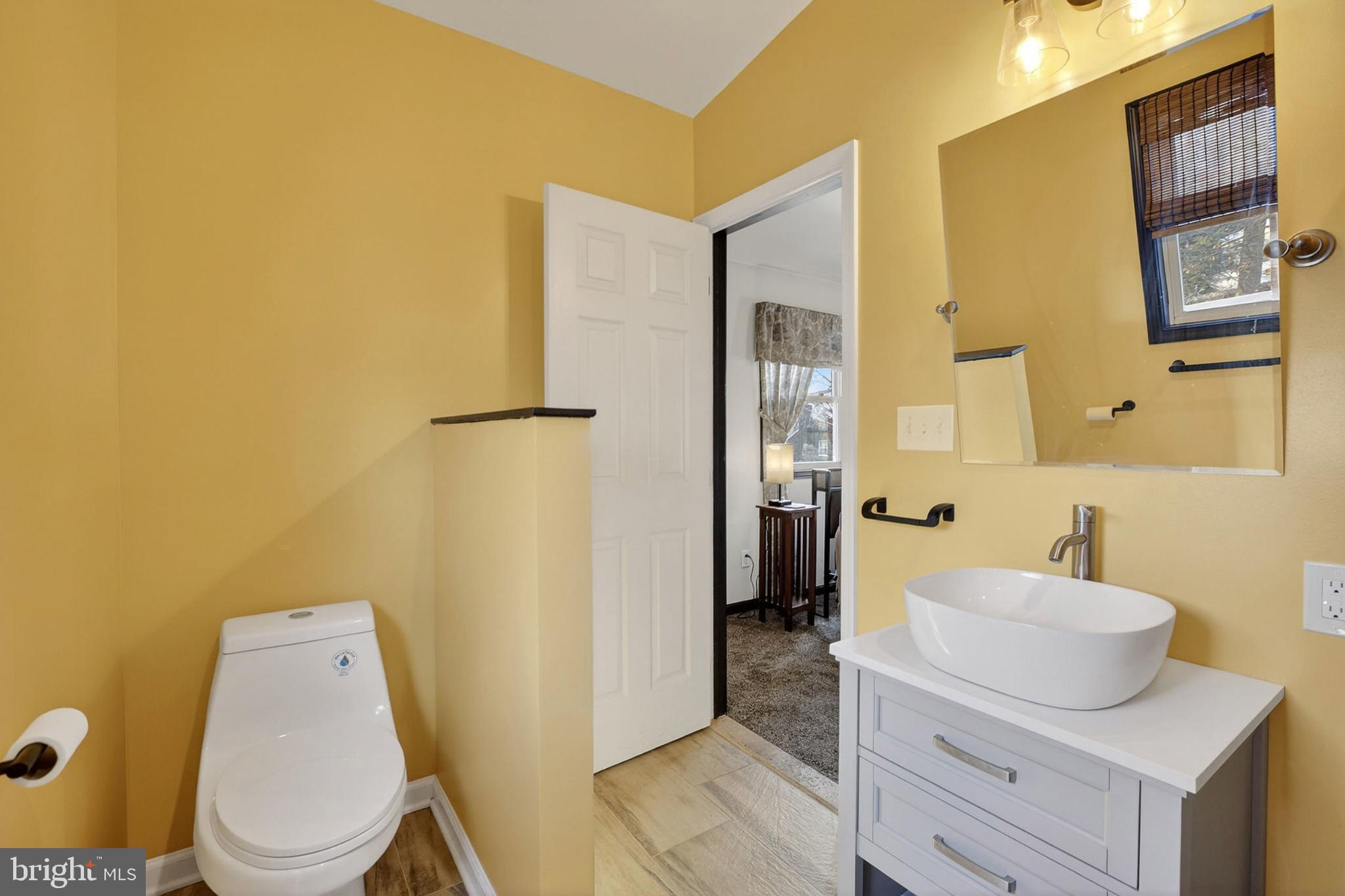 214 Waverly Road Wilmington, DE 19803 - Photo 20 of 47 Charming Master Bathroom with warm yellow hues.