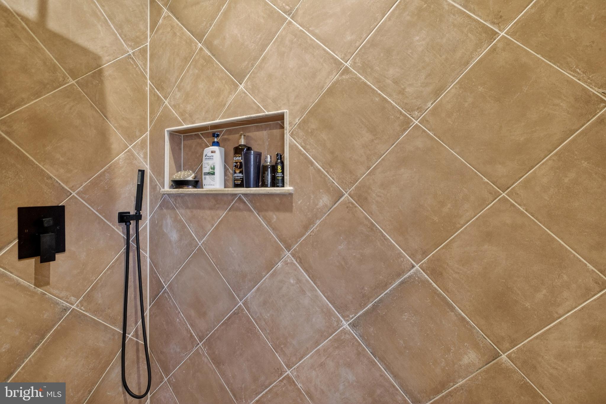 214 Waverly Road Wilmington, DE 19803 - Photo 22 of 47 Sleek shower design in with elegant tile work.