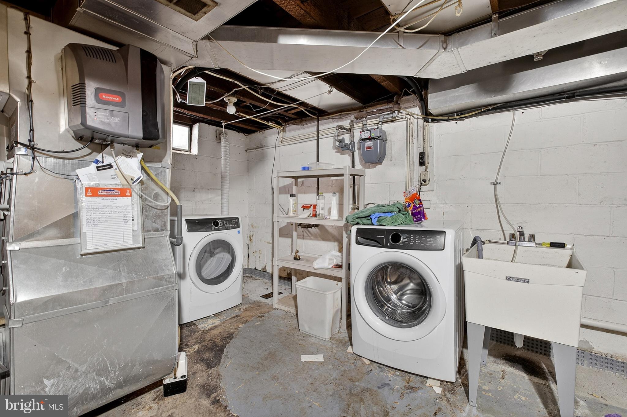 214 Waverly Road Wilmington, DE 19803 - Photo 35 of 47 Functional laundry space in the basement.
