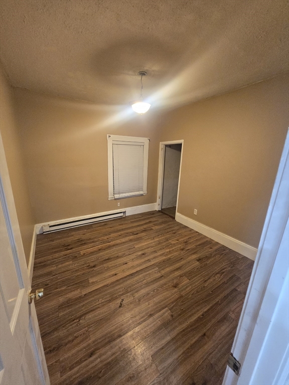 380 Grafton Street, Unit 1 Worcester, MA 01604 - Photo 7 of 8 a view of empty room with wooden floor