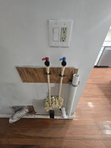 a view of dining room with furniture and wooden floor