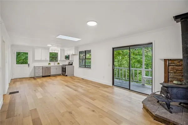 a view of balcony with wooden floor