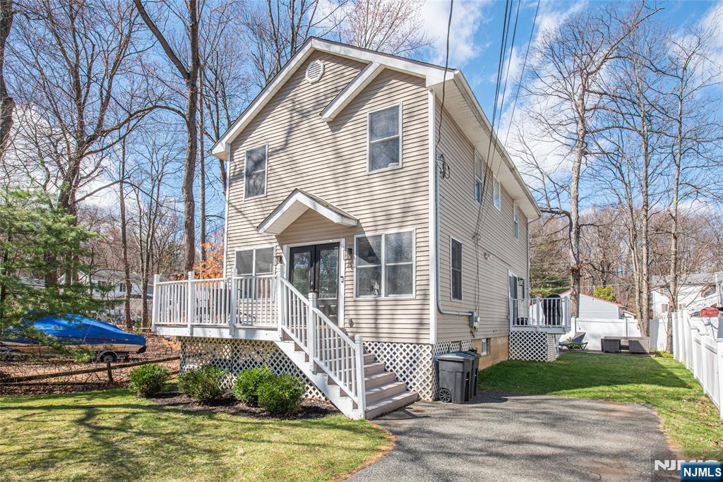 15 Orange Road Denville, NJ 07834 - Photo 1 of 24 a view of a house with a yard