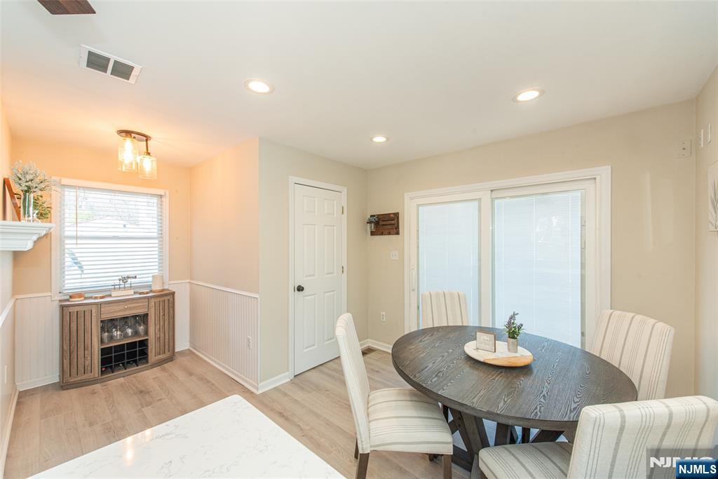 15 Orange Road Denville, NJ 07834 - Photo 12 of 24 a living room with furniture and a table