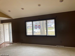 488 Catlin Road Cleveland, OH 44143 - Photo 11 of 23 Unfurnished room featuring lofted ceiling