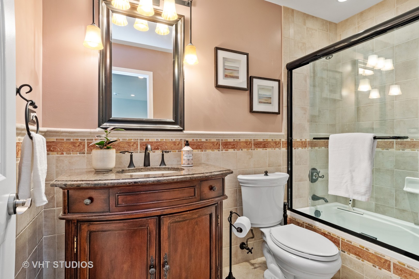 5S590 Radcliff Road Naperville, IL 60563 - Photo 17 of 27 a bathroom with a granite countertop toilet sink and mirror