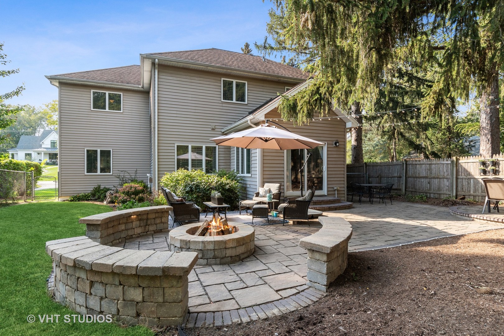 5S590 Radcliff Road Naperville, IL 60563 - Photo 21 of 27 a view of a house with backyard and sitting area