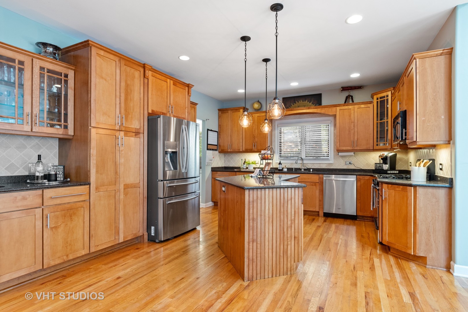 5S590 Radcliff Road Naperville, IL 60563 - Photo 5 of 27 a kitchen with stainless steel appliances granite countertop a refrigerator a oven a sink dishwasher and white cabinets with wooden floor
