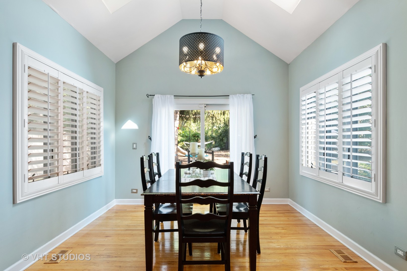 5S590 Radcliff Road Naperville, IL 60563 - Photo 7 of 27 a view of a dining room with furniture window and wooden floor