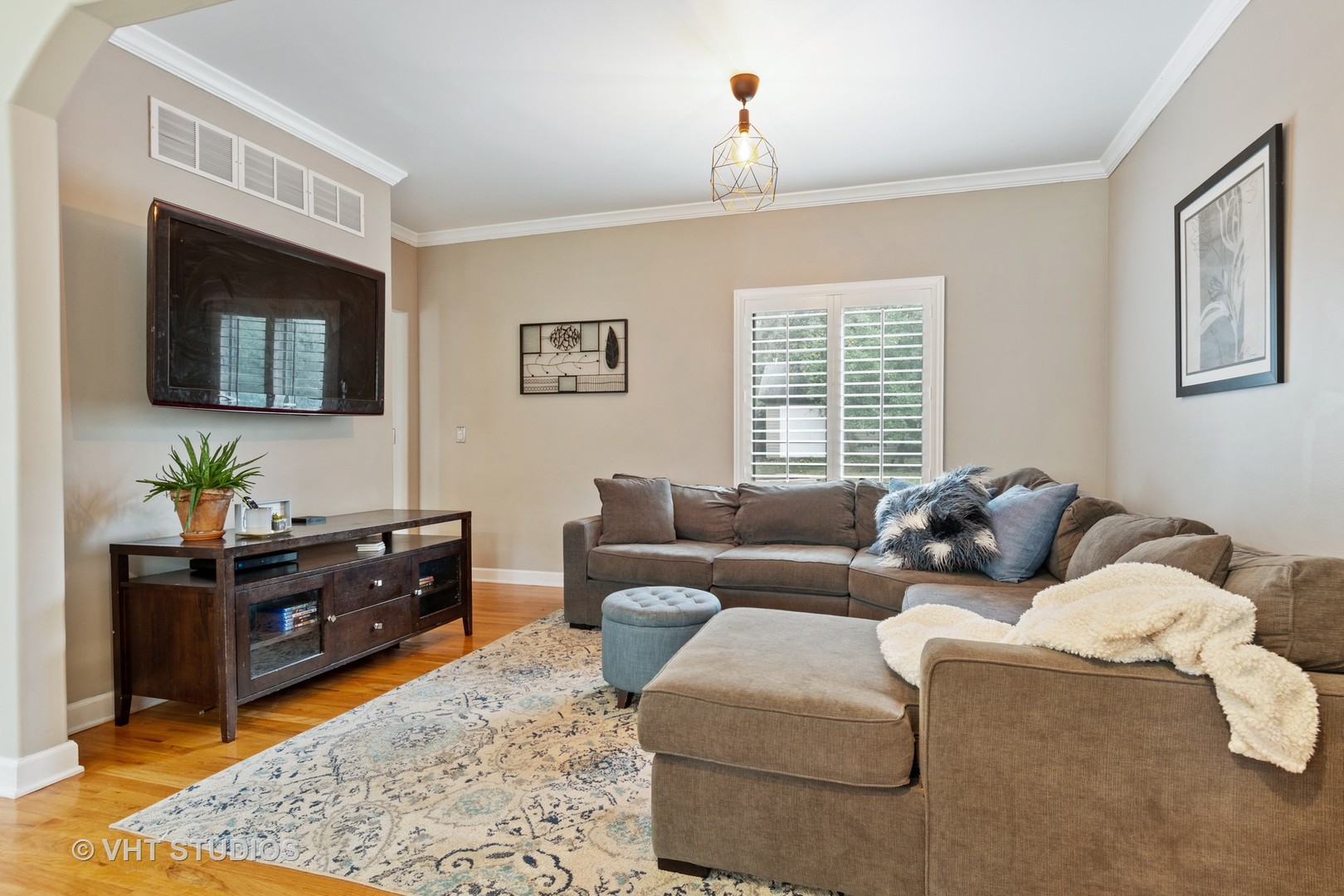 5S590 Radcliff Road Naperville, IL 60563 - Photo 9 of 27 a living room with furniture window and a flat screen tv
