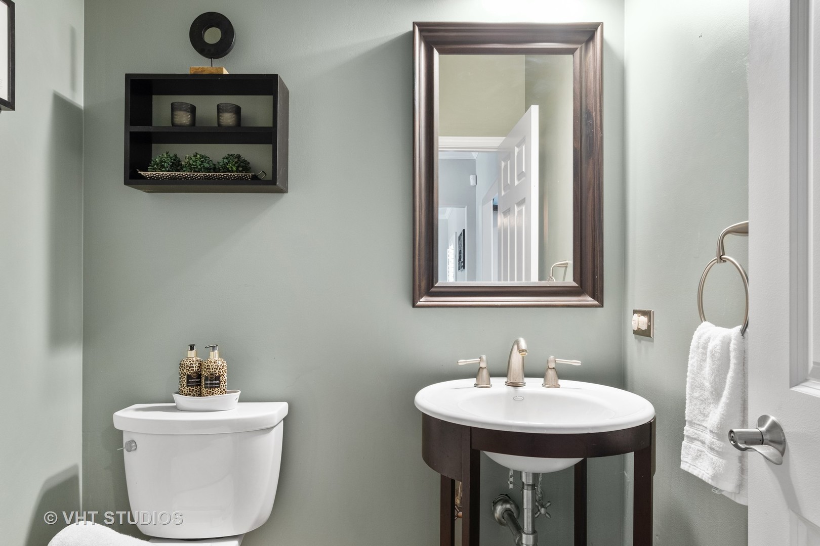 5S590 Radcliff Road Naperville, IL 60563 - Photo 10 of 27 a bathroom with a sink a mirror and a toilet