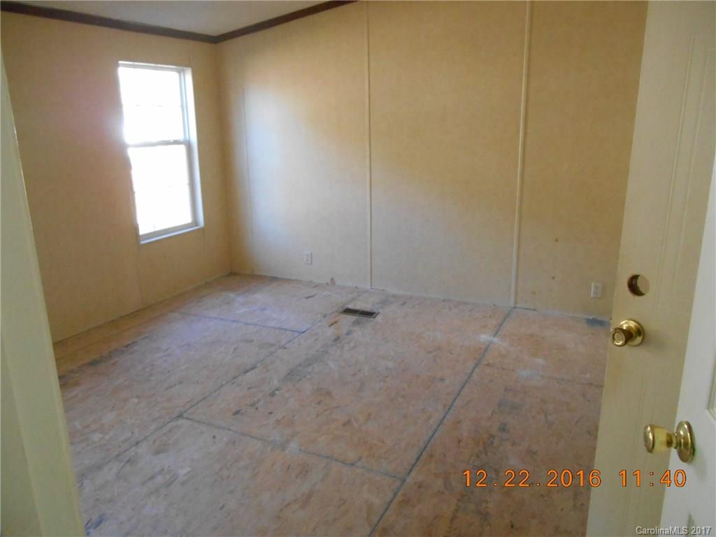 1758 Millen Road, Unit 8 Chester, SC 29706 - Photo 5 of 13 a view of an empty room with a window