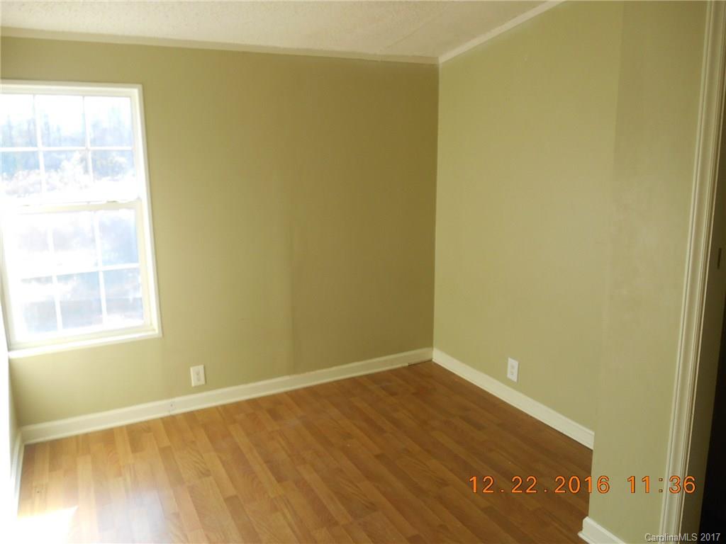 1758 Millen Road, Unit 8 Chester, SC 29706 - Photo 7 of 13 a view of an empty room with a window