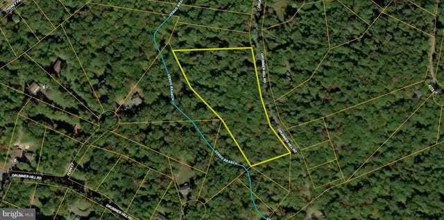 an aerial view of a residential houses