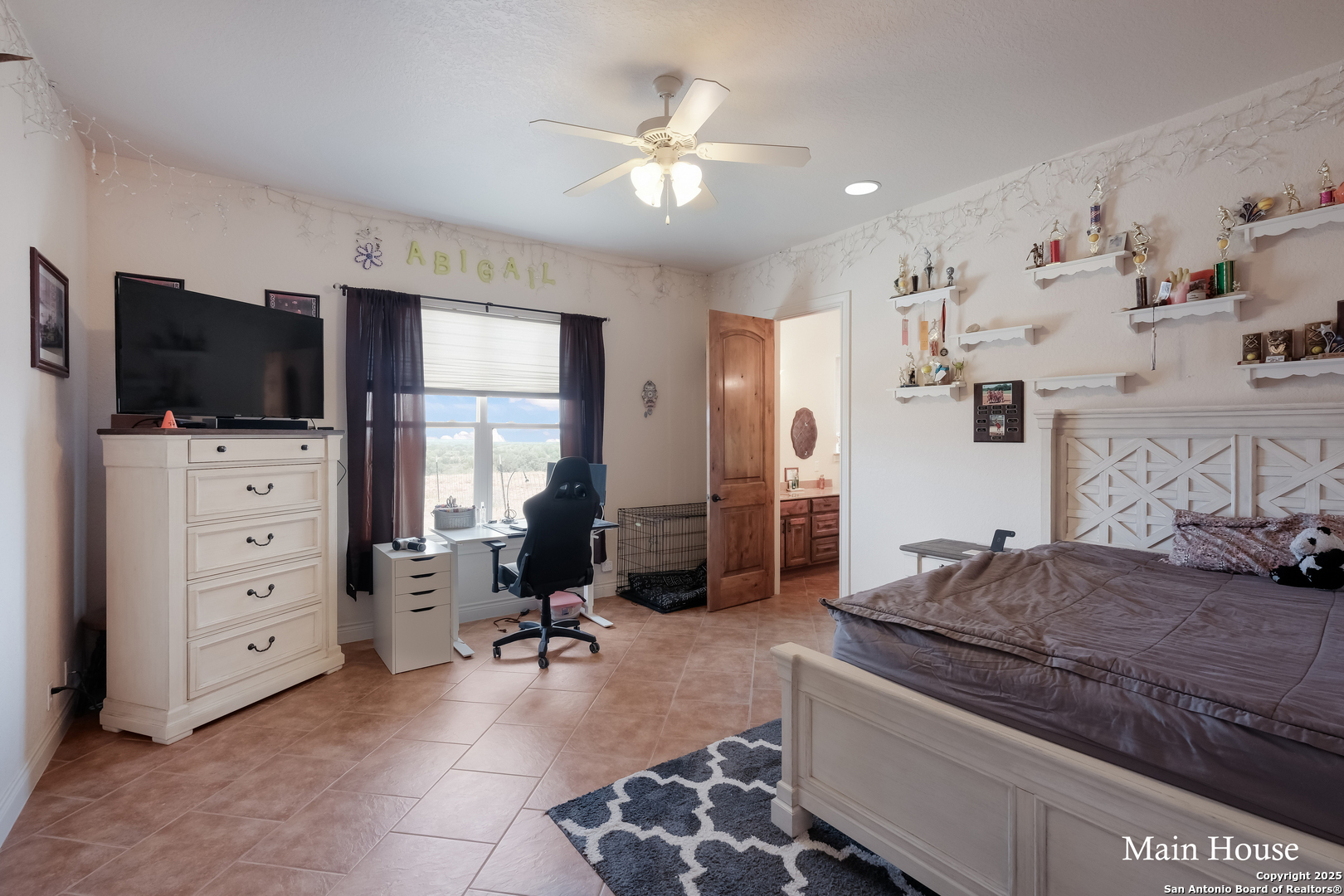208 Private Road 378 Rio Medina, TX 78066 - Photo 11 of 30 a living room with furniture and flat screen tv