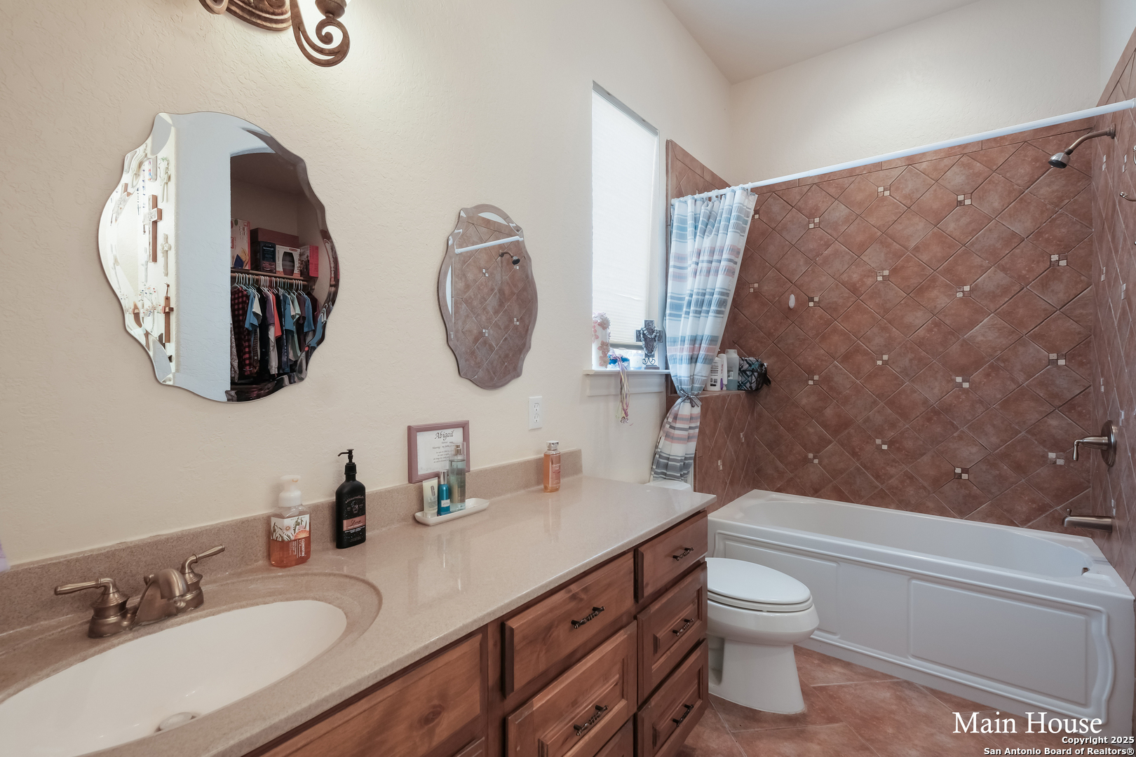 208 Private Road 378 Rio Medina, TX 78066 - Photo 12 of 30 a bathroom with a granite countertop sink mirror and toilet