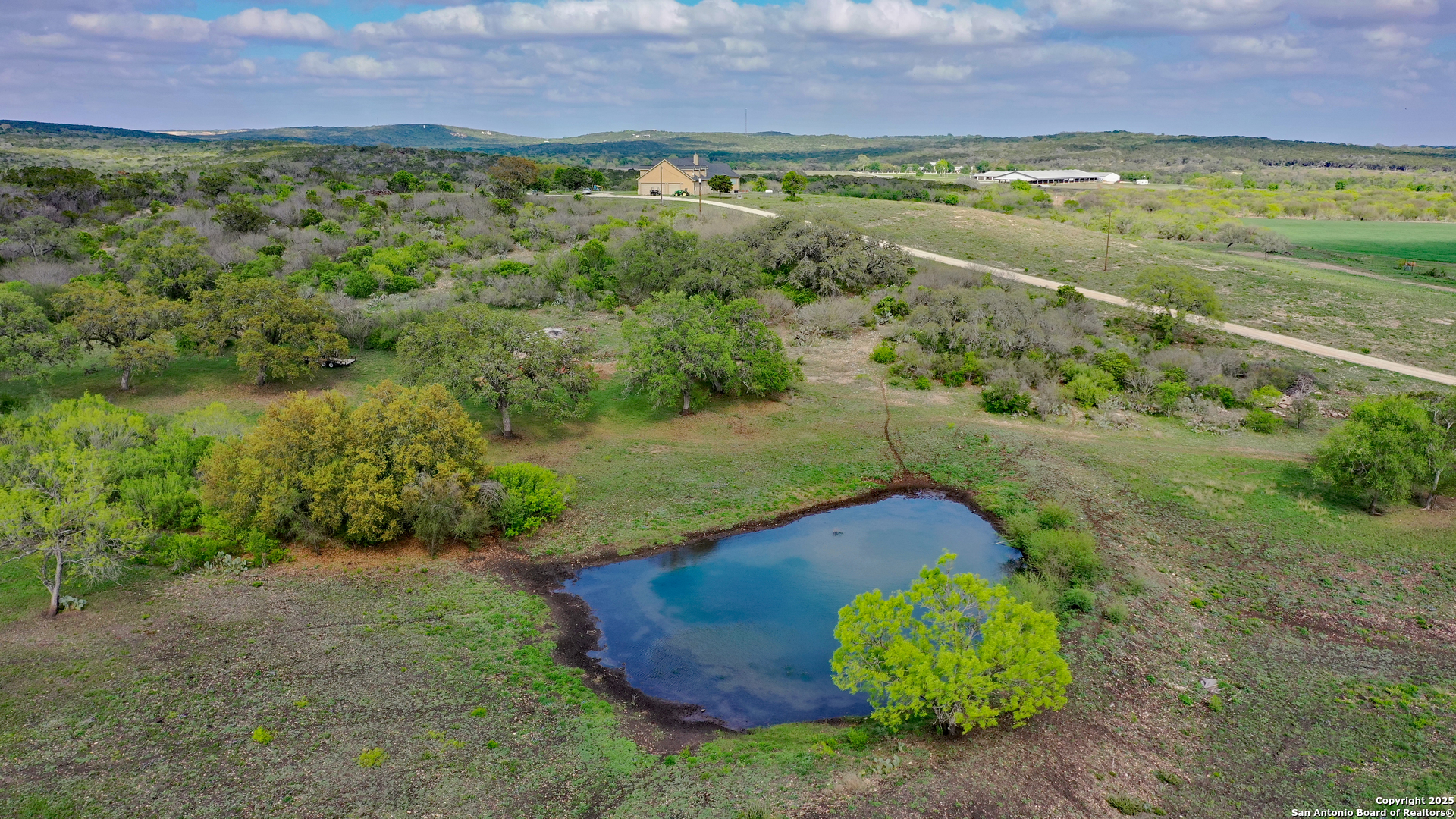 208 Private Road 378 Rio Medina, TX 78066 - Photo 14 of 30 a view of a field with an ocean