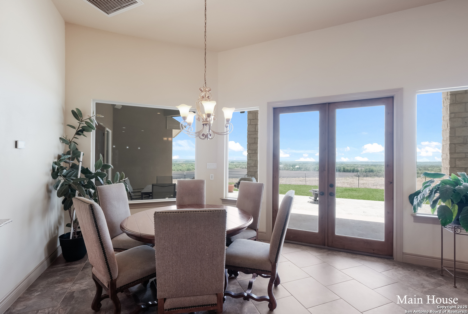 208 Private Road 378 Rio Medina, TX 78066 - Photo 6 of 30 a view of a dining room with furniture window and outside view