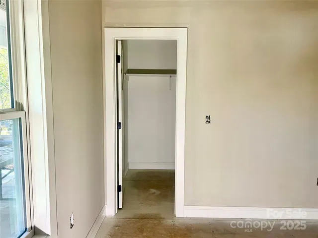 a view of a bathroom with a glass door