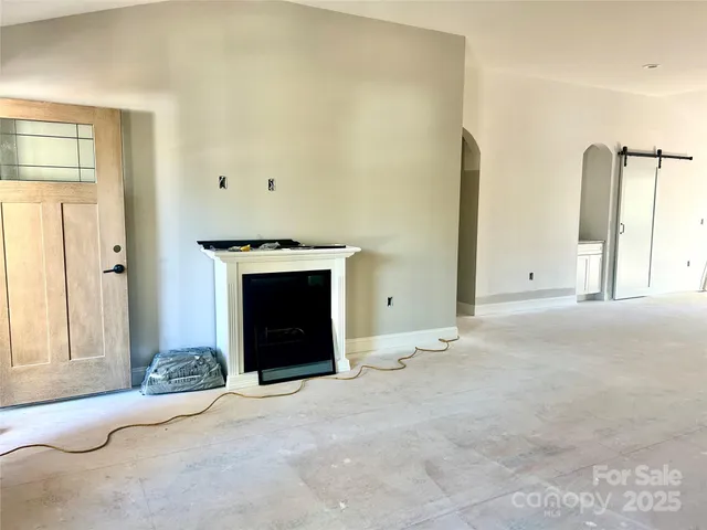a view of a livingroom with a fireplace