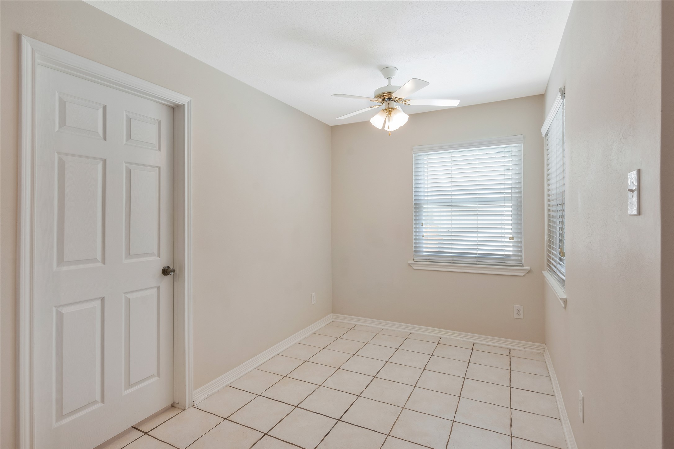17926 Cypress Spring Drive Spring, TX 77388 - Photo 14 of 34 a view of an empty room with a window