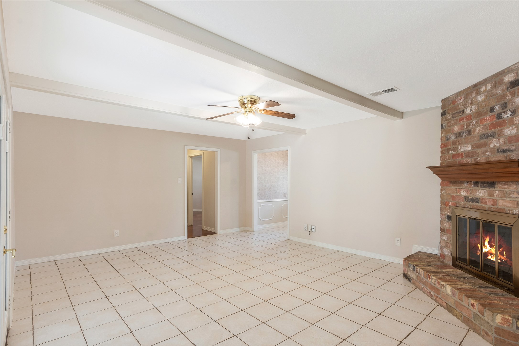 17926 Cypress Spring Drive Spring, TX 77388 - Photo 19 of 34 a view of an empty room with a fireplace