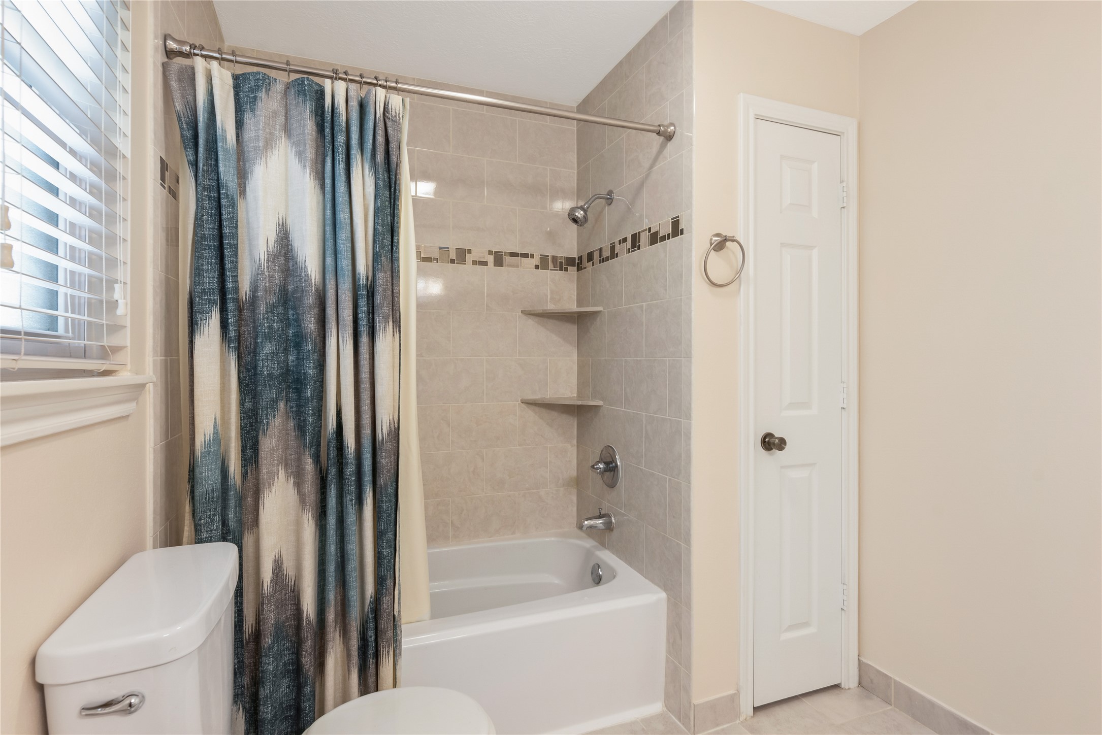 17926 Cypress Spring Drive Spring, TX 77388 - Photo 27 of 34 a bathroom with a bathtub and a shower