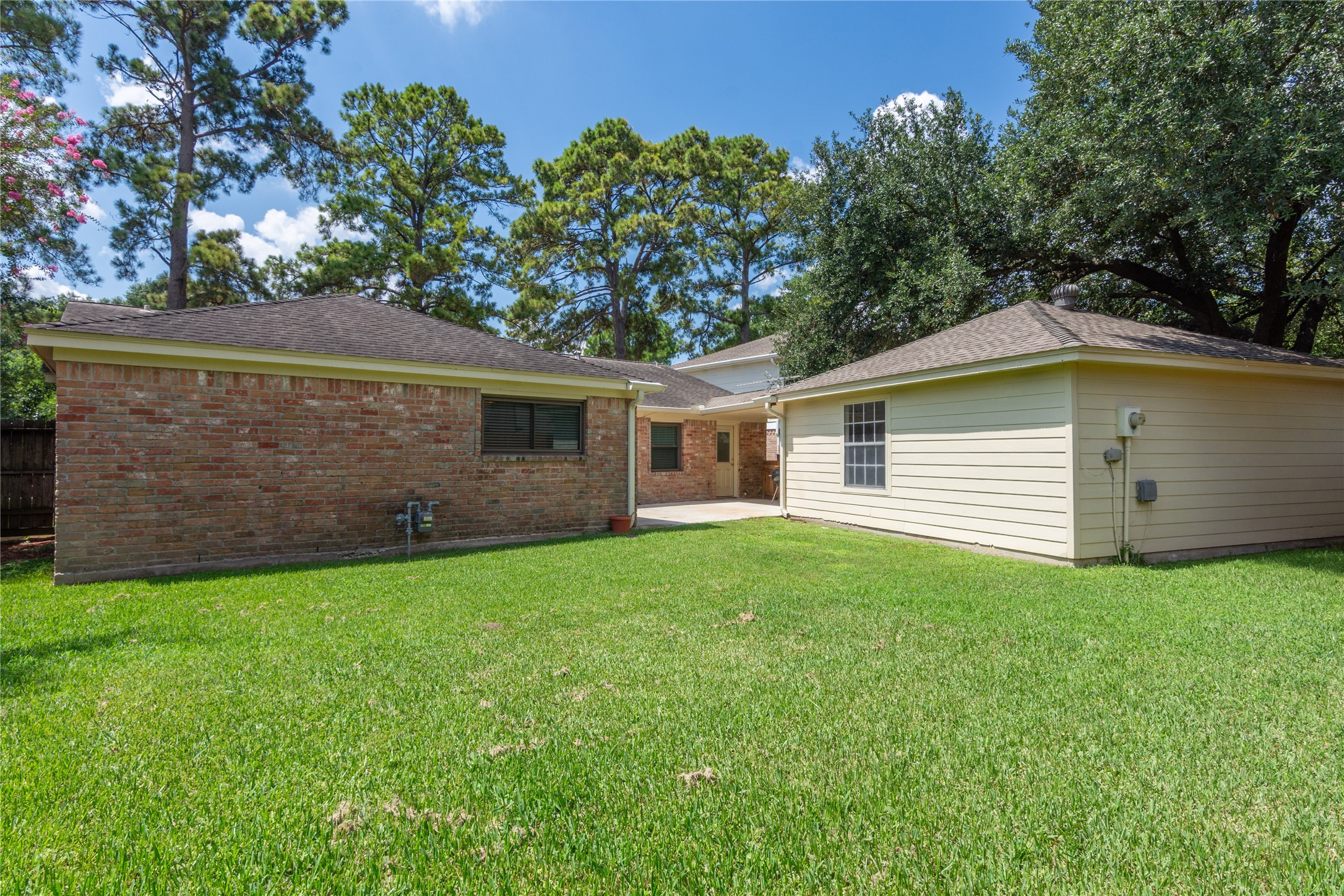 17926 Cypress Spring Drive Spring, TX 77388 - Photo 33 of 34 a backyard of a house with lots of green space