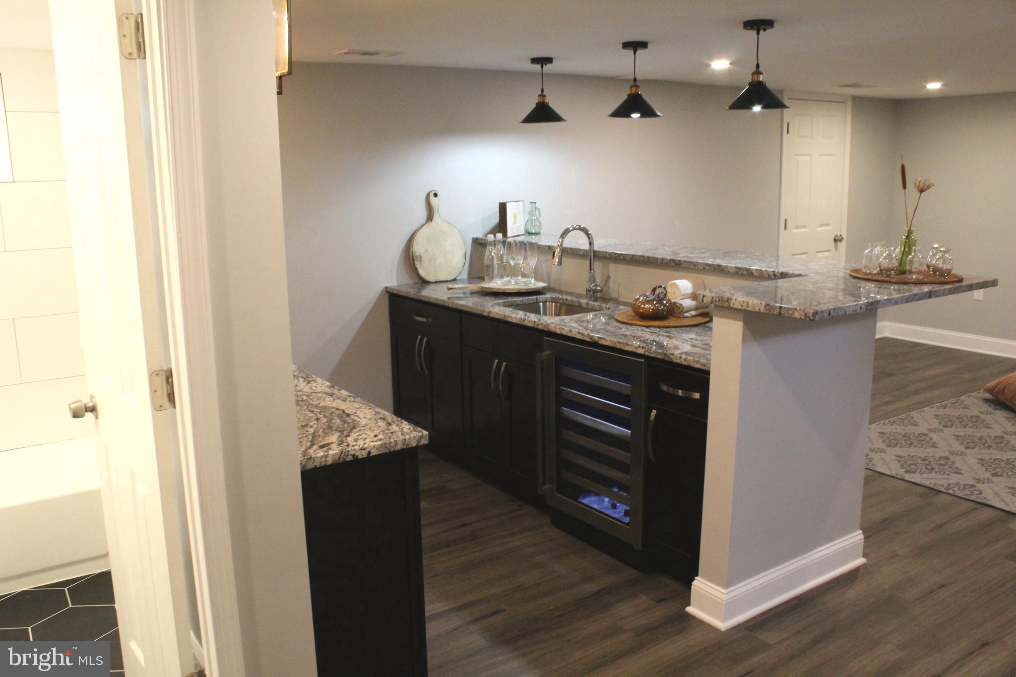 4300 Sundown Road Gaithersburg, MD 20882 - Photo 29 of 41 Basement Kitchen/Bar