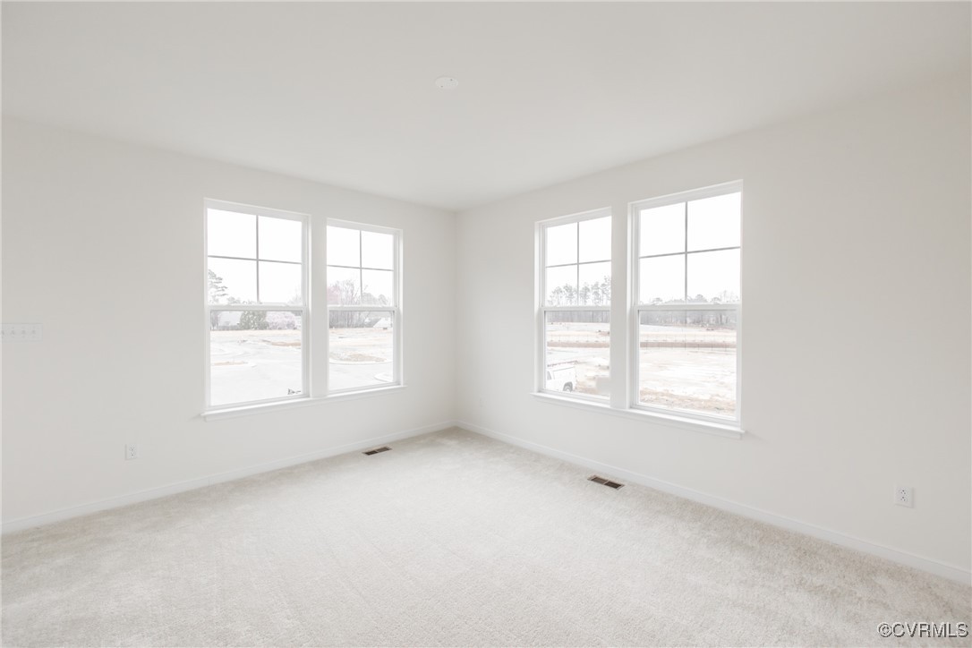 5320 Good Landing Road, Unit 103 Glen Allen, VA 23059 - Photo 11 of 37 an empty room with a window