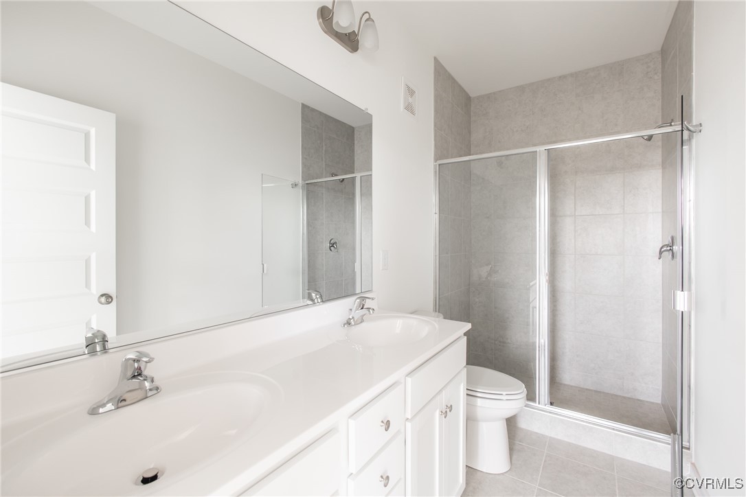 5320 Good Landing Road, Unit 103 Glen Allen, VA 23059 - Photo 13 of 37 a bathroom with a sink toilet and shower