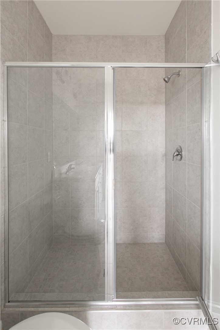 5320 Good Landing Road, Unit 103 Glen Allen, VA 23059 - Photo 14 of 37 a bathroom with a glass shower door
