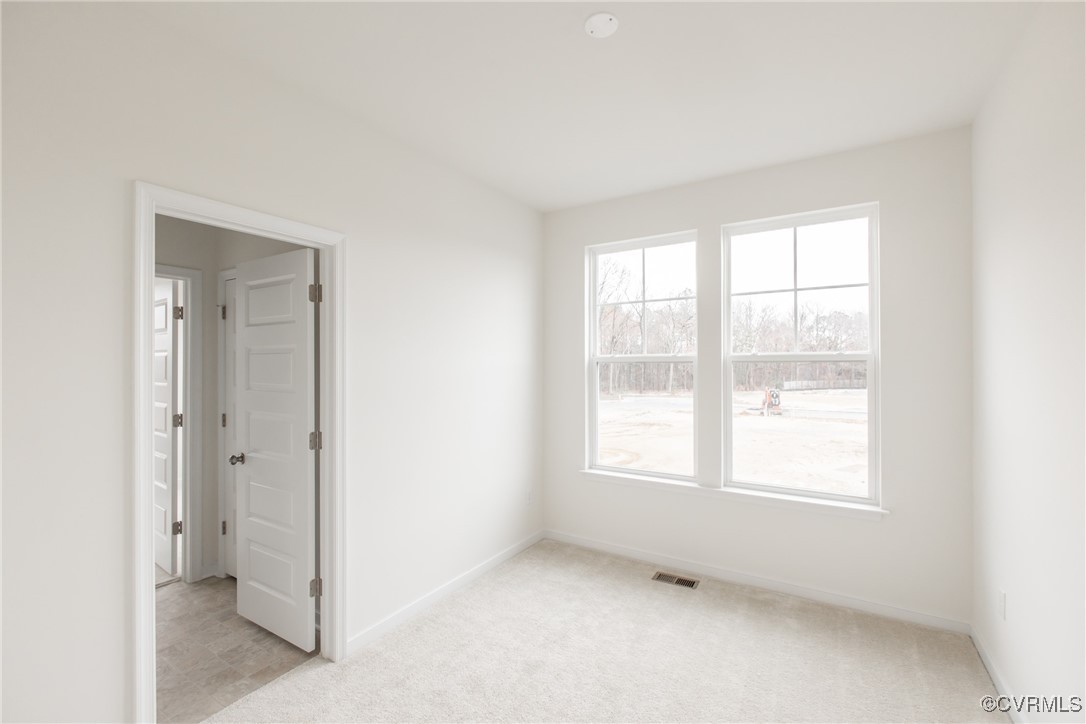 5320 Good Landing Road, Unit 103 Glen Allen, VA 23059 - Photo 15 of 37 a view of an empty room with a window