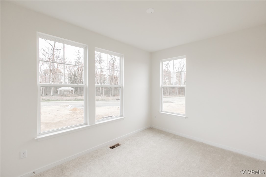 5320 Good Landing Road, Unit 103 Glen Allen, VA 23059 - Photo 20 of 37 an empty room with a window