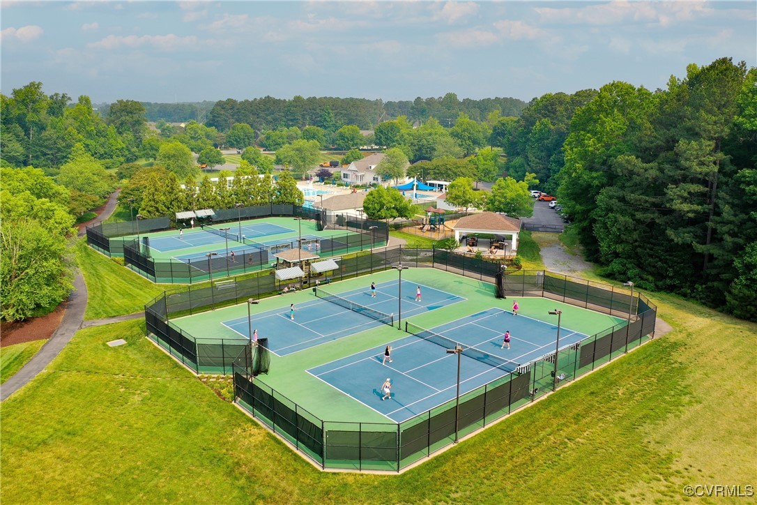 5320 Good Landing Road, Unit 103 Glen Allen, VA 23059 - Photo 36 of 37 a view of a pool with a table and chairs