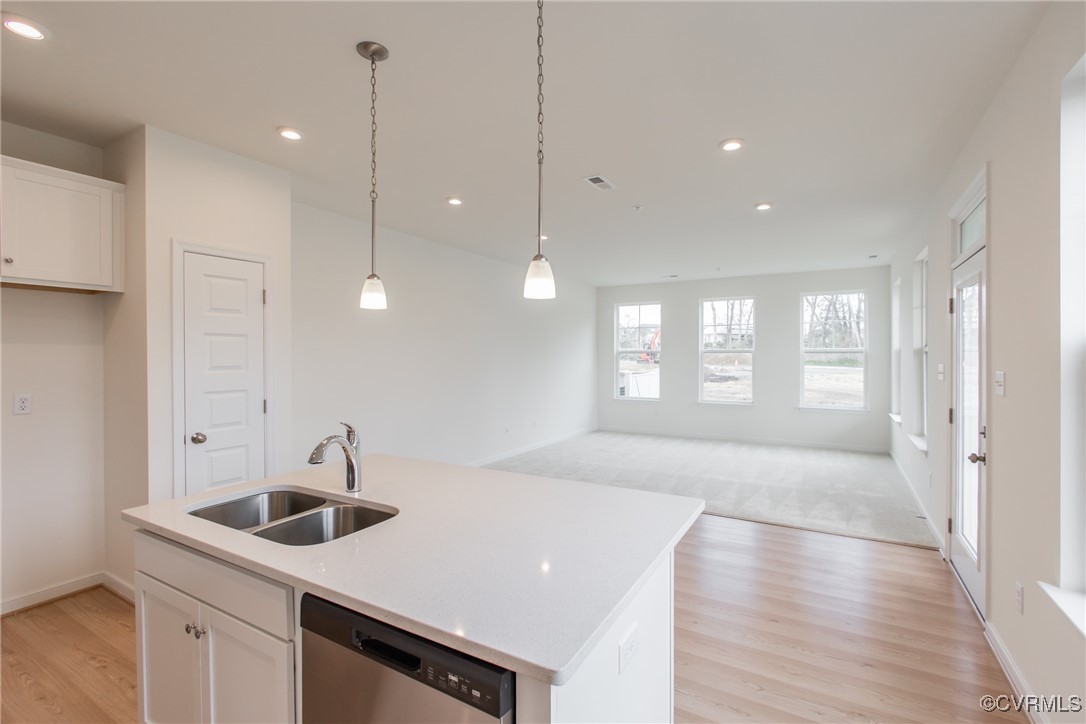 5320 Good Landing Road, Unit 103 Glen Allen, VA 23059 - Photo 6 of 37 a kitchen with a sink a large window and stainless steel appliances