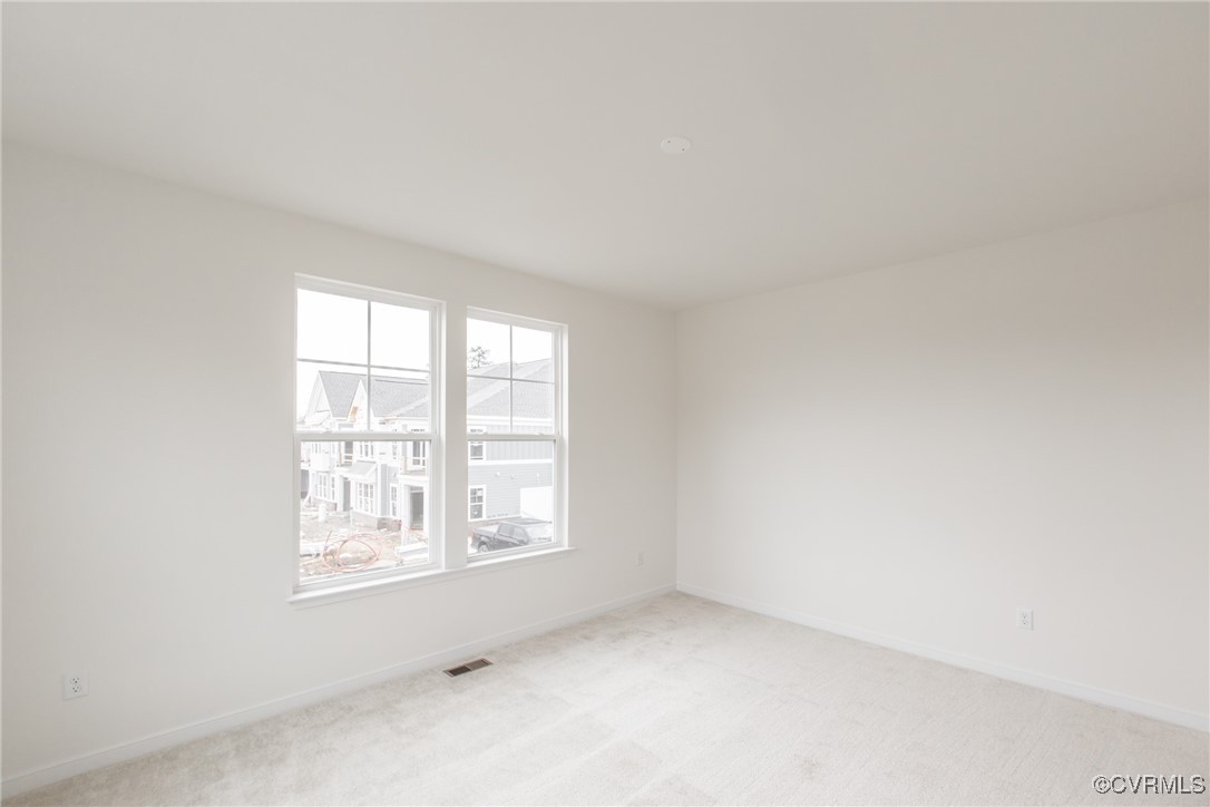 5320 Good Landing Road, Unit 103 Glen Allen, VA 23059 - Photo 10 of 37 an empty room with a window