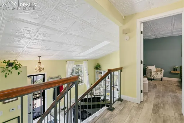 a view of entryway with wooden floor