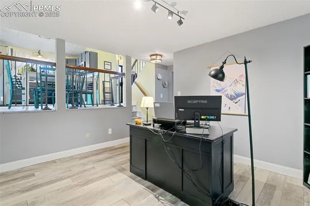 a view of kitchen with cabinets