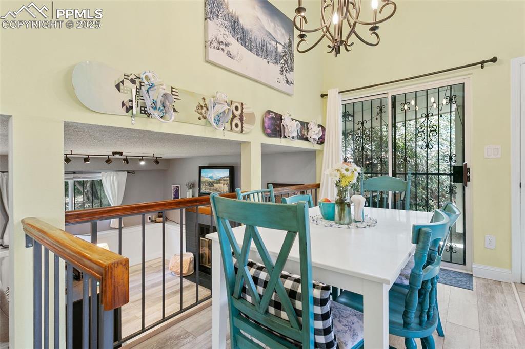 2960 Rio Vista Drive Colorado Springs, CO 80917 - Photo 8 of 32 a view of a dining room with furniture window and outside view