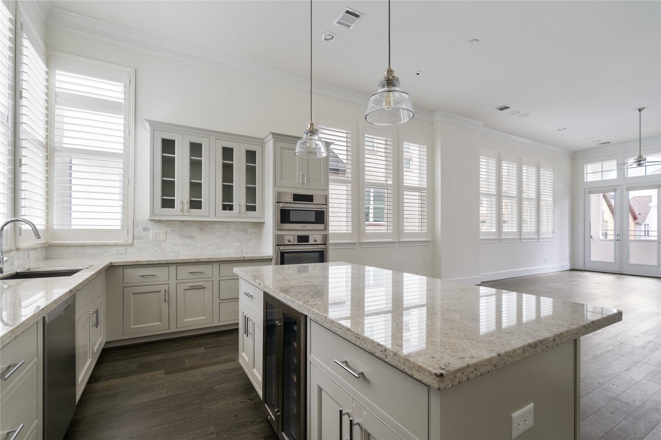 2613 Maxroy Street Houston, TX 77007 - Photo 8 of 43 Oversized island includes a built-in wine fridge for effortless entertaining.