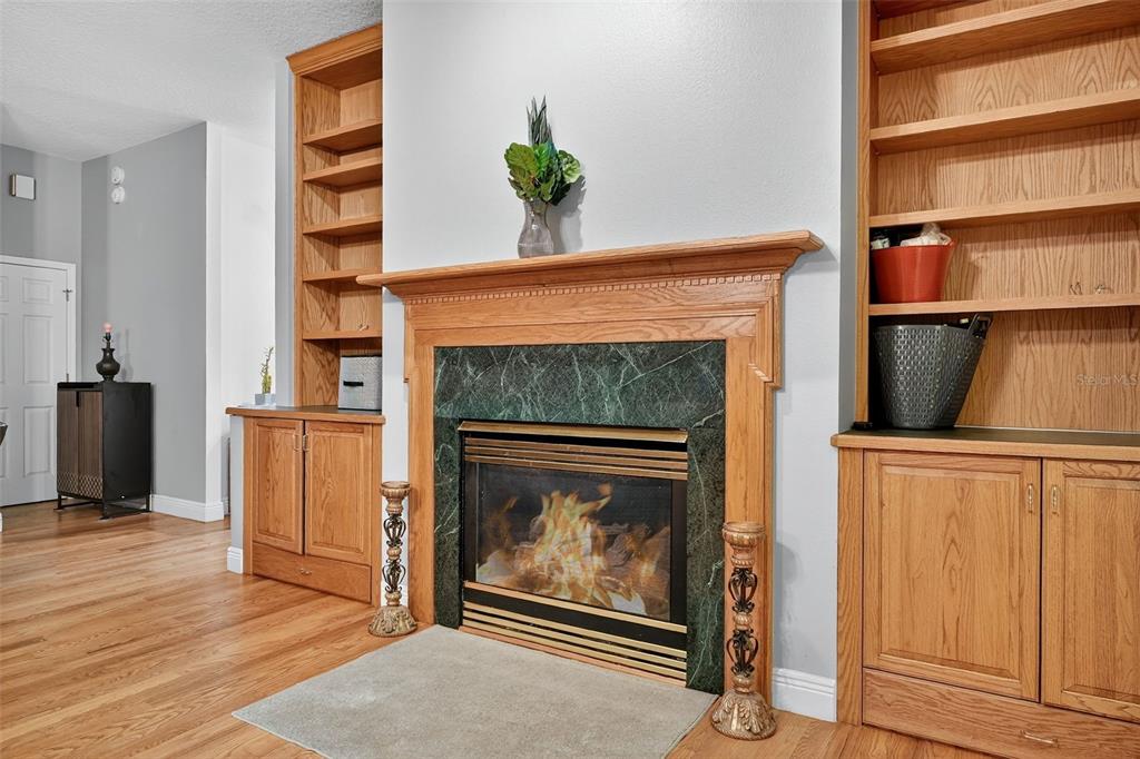 2836 Shenandoah Road DeLand, FL 32720 - Photo 21 of 46 a living room with furniture and a fireplace