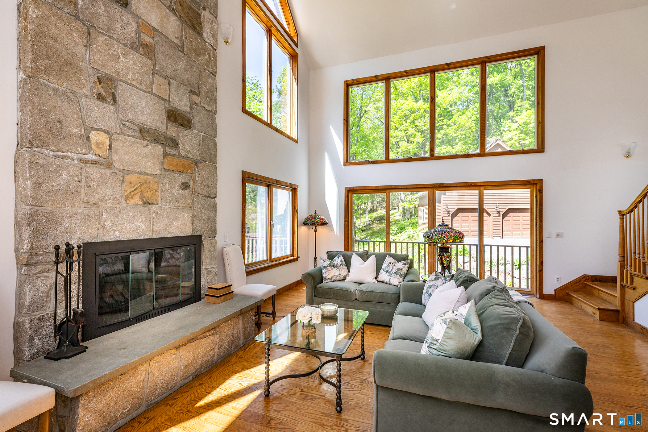 3 Old Forest Road Sherman, CT 06784 - Photo 4 of 38 a living room with fireplace furniture and a floor to ceiling window