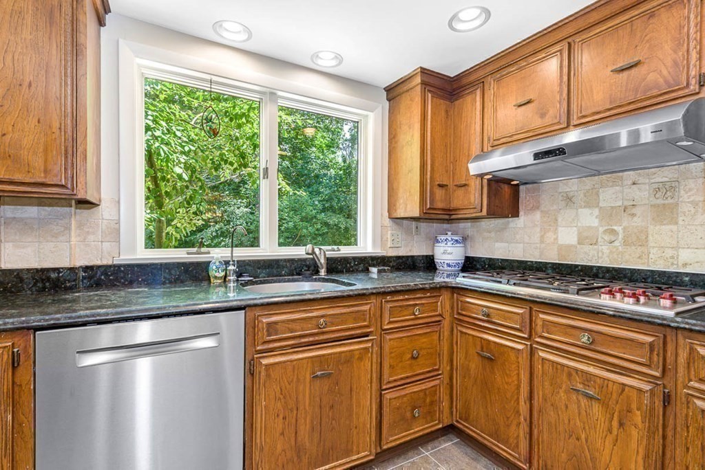 2 King George Drive Boxford, MA 01921 - Photo 12 of 41 a kitchen with granite countertop a sink and a window