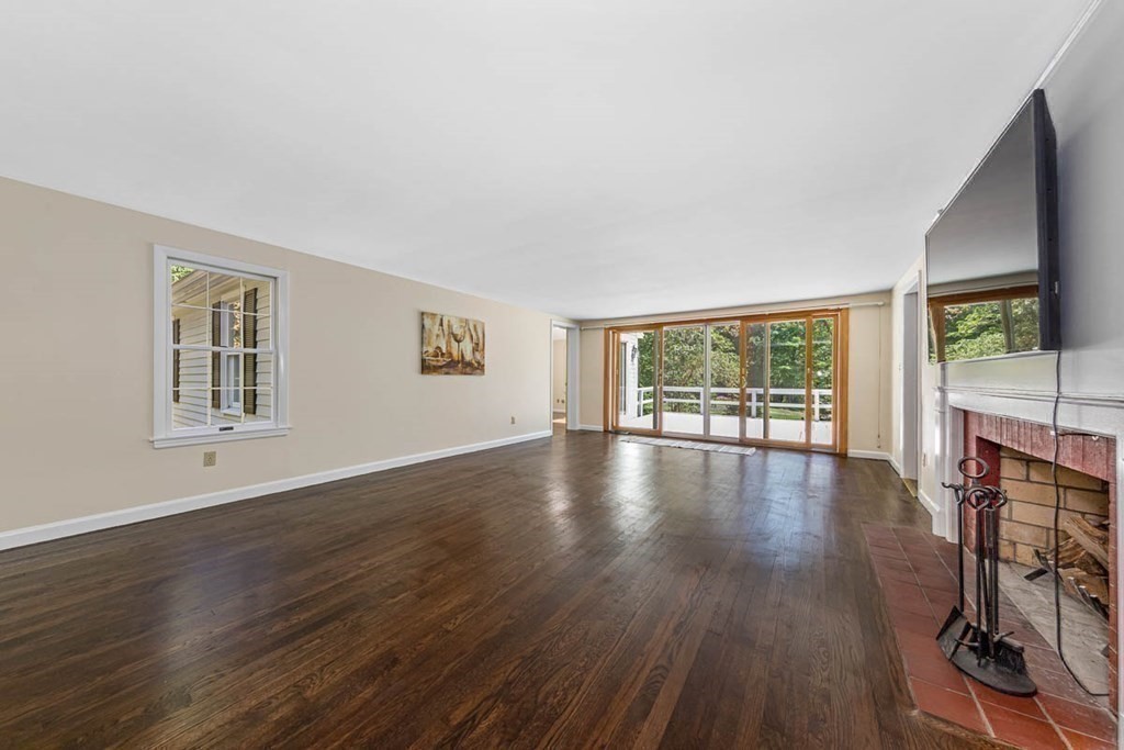 2 King George Drive Boxford, MA 01921 - Photo 18 of 41 a view of wooden floor wooden cabinets and windows in a room