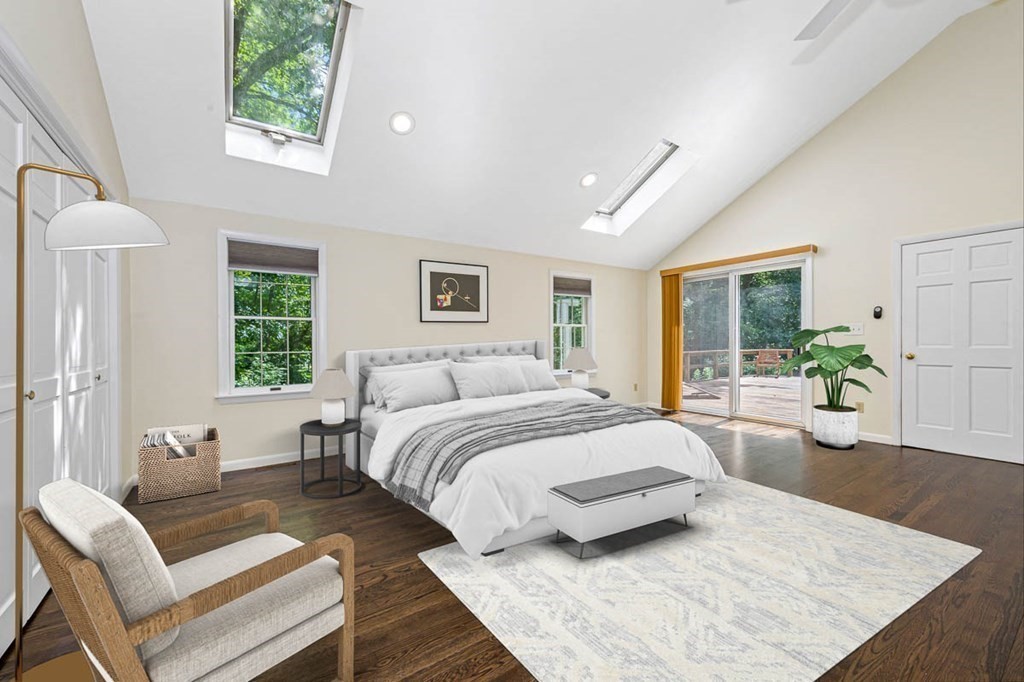 2 King George Drive Boxford, MA 01921 - Photo 29 of 41 a spacious bedroom with a bed a couch and large window